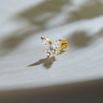 Nose pin lab grown diamond with butterfly shaped diamond cluster in gold on soft background