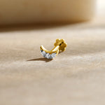 Crescent moon-shaped diamond stud earring in 14k gold