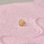 Gold domed stud earring with mesh cutout design