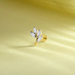 14k gold botanical stud earring featuring marquise diamond leaves on a branch