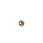 Front view of a tiny 18K nose pin gold on a clean white background highlighting its compact circular design