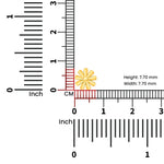 Measurement view of 18K gold daisy nose pin placed next to ruler indicating compact size