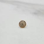 Close up of round geometric gold nose pin design on white background elegant and minimal for women