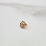 Side view of handcrafted circular gold nose pin design reflecting modern indian artistry and polish