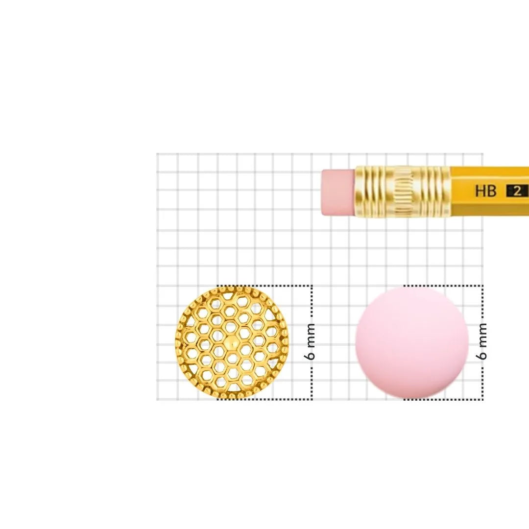 Gold nose pin displayed beside pencil for size comparison highlighting fine handcrafted detailing