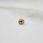 Close up of heart pattern gold nose pin design on white background ideal for elegant modern women