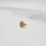 Side view of handcrafted 18k heart gold nose pin design reflecting sleek polish and modern aesthetic