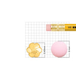 Size reference image of flower motif gold nose pin shown on a grid background with measurement scale