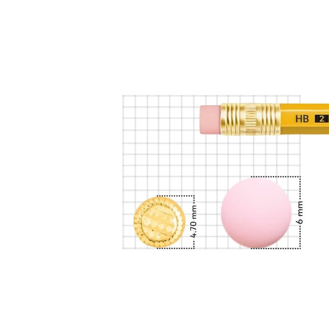Gold nose pin displayed beside pencil for size comparison highlighting precise craftsmanship and small size