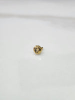 Side view of handcrafted 18k circular gold nose pin design featuring polished finish and intricate detailing
