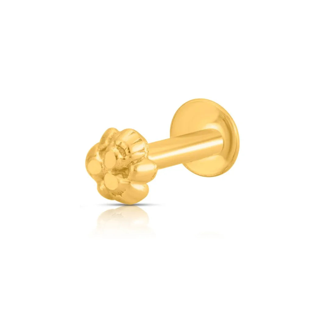 Gold-colored lip nose pin nose ring on a white background