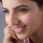 Woman wearing 18K Nose Pin Gold showcasing a simple and elegant everyday ethnic look