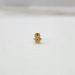 Side view of delicate 18K nose pin gold placed on a white background showing its polished finish