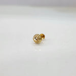 Tiny round 18K nose pin gold displayed on a white background showing its minimal sleek design