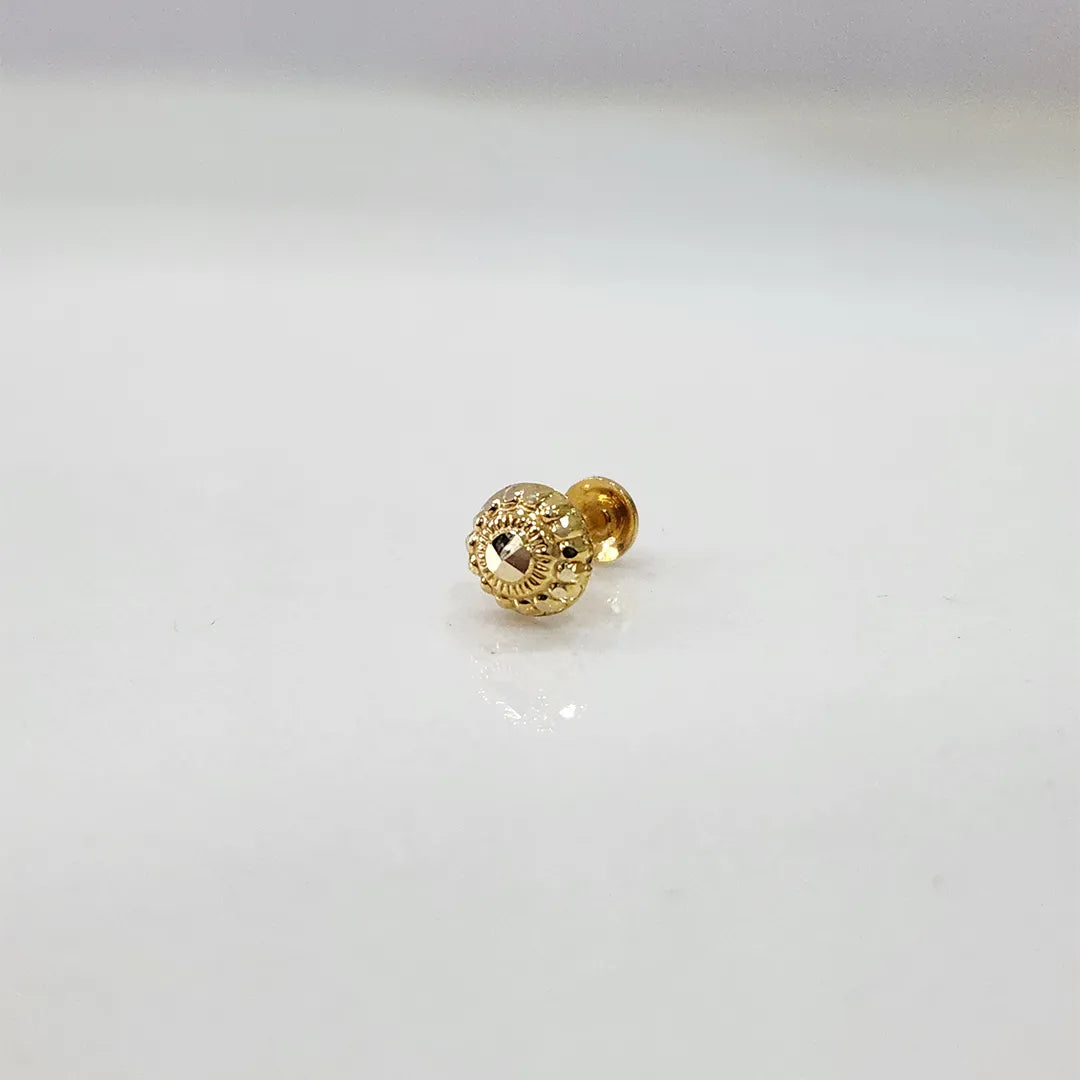 Tiny round 18K nose pin gold displayed on a white background showing its minimal sleek design