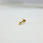 Side view of a plain 18K gold nose pin placed on a white background displaying the straight post and flat back