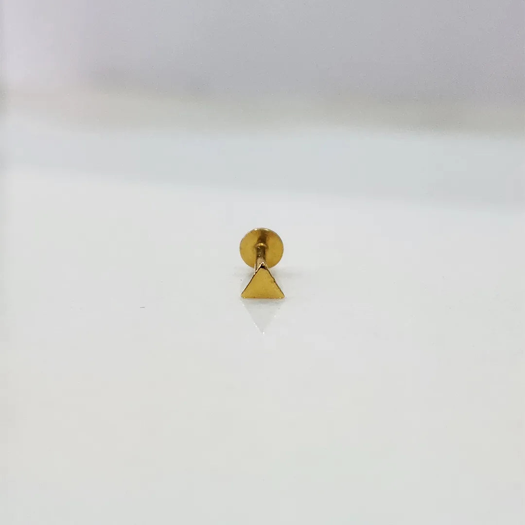 Front view of triangle gold nose pin on white background showing simple and elegant shape