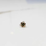 Alternate front angle of the floral stone nose pin displaying balanced stone placement