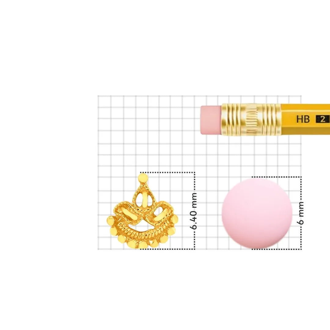 Gold nose pin displayed beside pencil for size comparison highlighting detailed craftsmanship