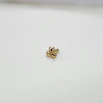 Side view of 18k three petal gold nose pin design highlighting beautiful craftsmanship and smooth polish