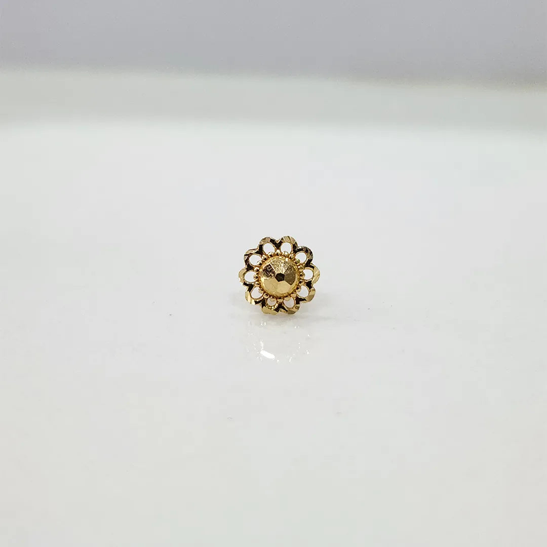 Front view of a small floral 18K nose pin gold on a white background showing compact size and fine detailing