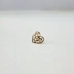 Close up of heart shaped gold nose pin design on white background perfect for women’s daily jewellery style