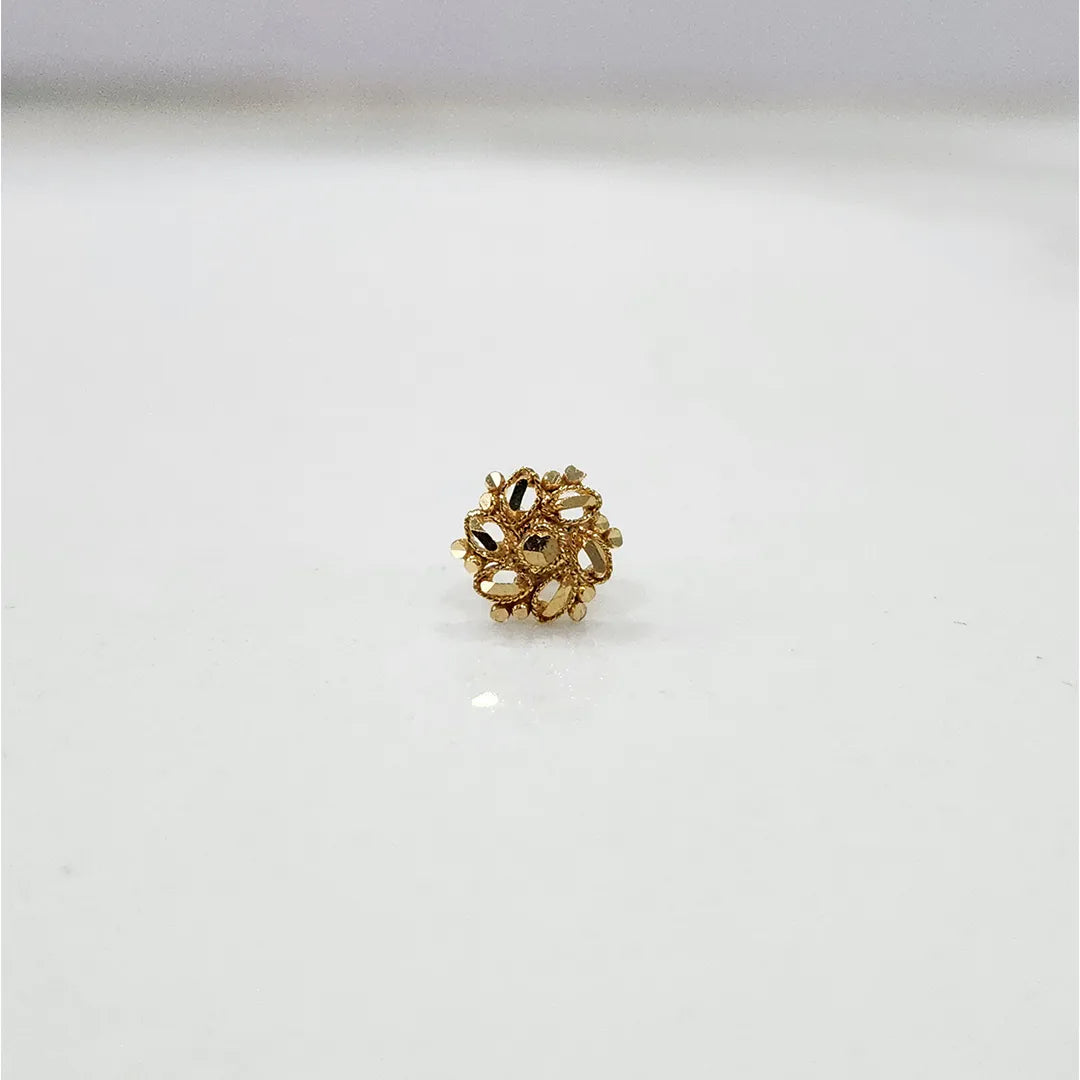 Front view of a small 18K nose pin gold placed on a white background showing detailed floral pattern