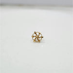 Front view of a small floral 18K nose pin gold placed on a clean white background showing fine detailing