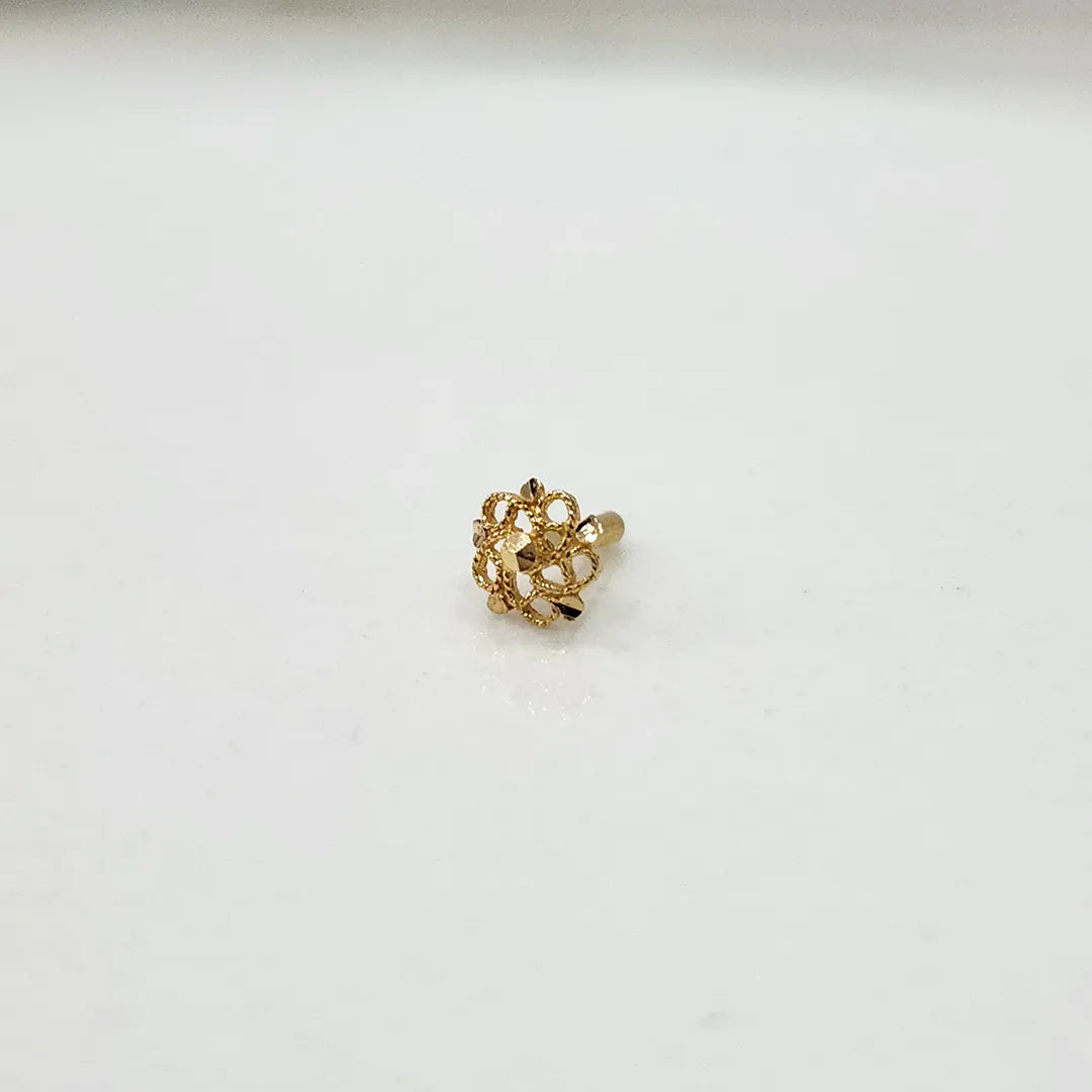 Front view of a small 18K nose pin gold placed on a clean white background showing fine detailing
