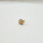 Front view of a small 18K nose pin gold placed on a clean white background showing fine detailing