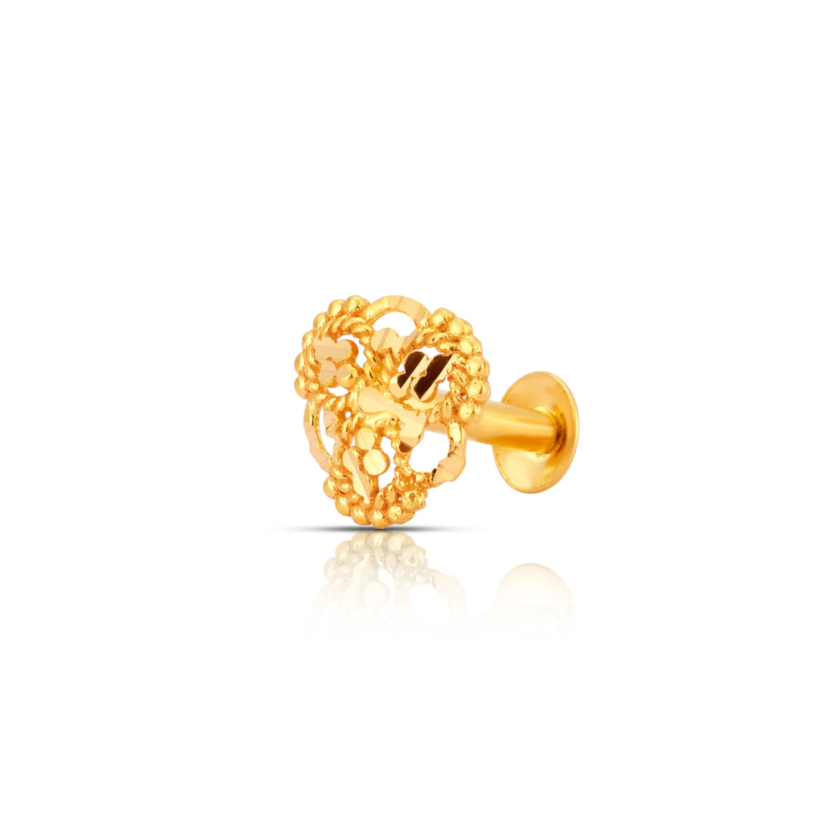 Angled studio view of floral motif 18K gold nose pin on a white background showing intricate cutwork details