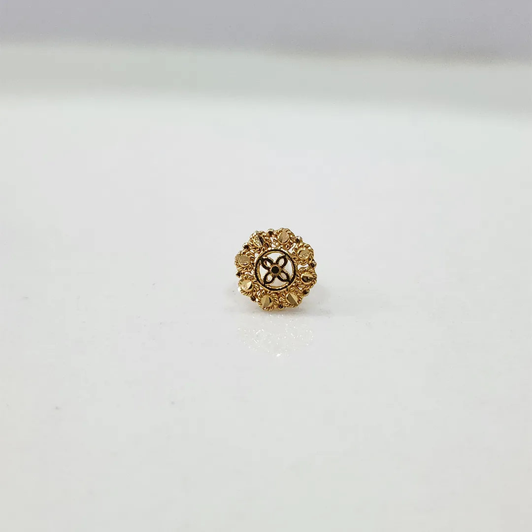 Front view of small floral gold nose pin on a white background displaying precise design and finish