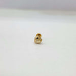 Front view of tiny heart 18K nose pin gold on a clean white background showing its delicate shape