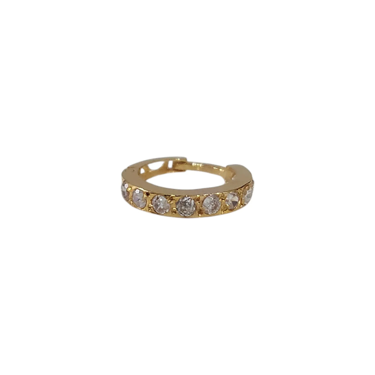 Top view of the gemstone gold nose ring on a white background highlighting circular symmetry