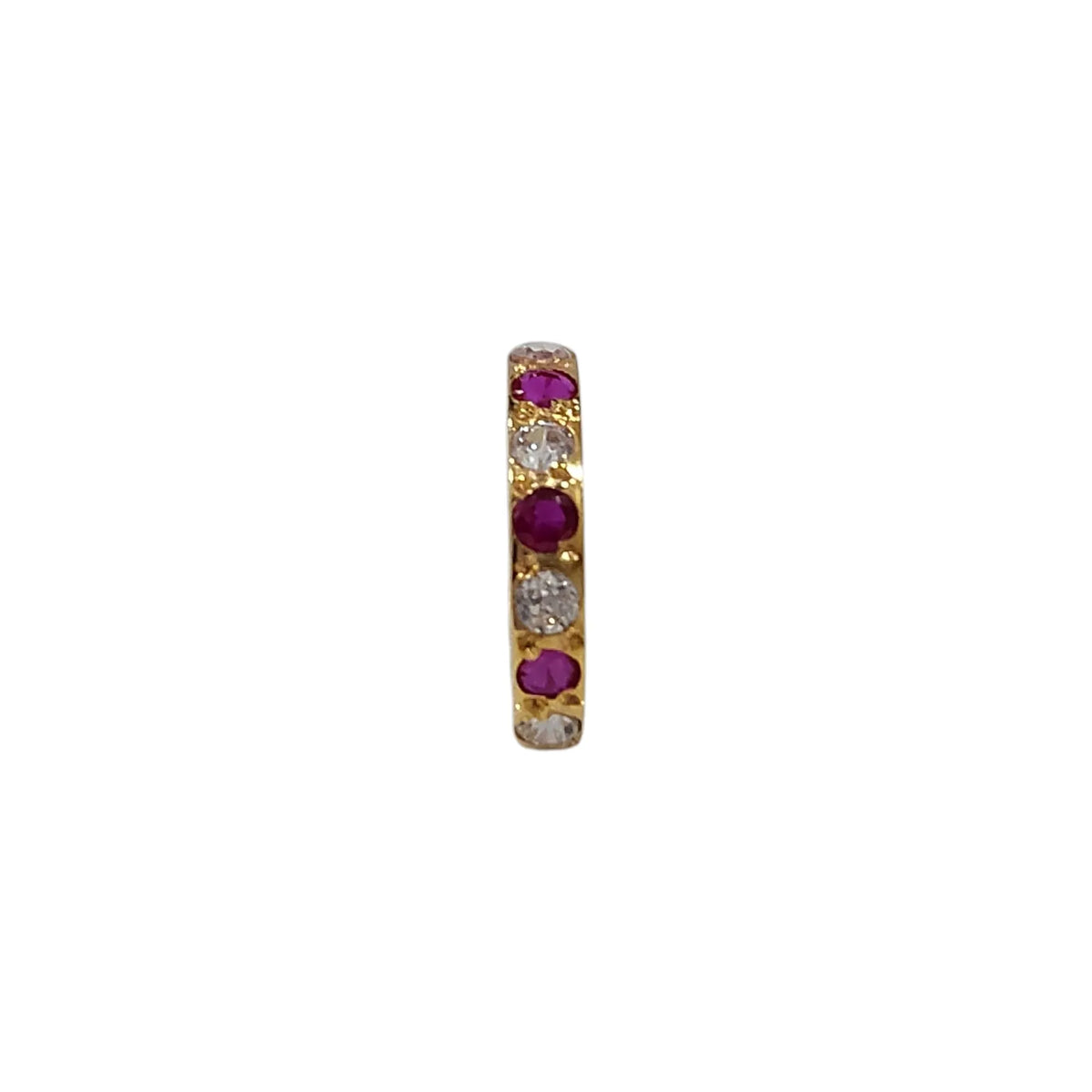 Side view of the gemstone gold nose ring on a white background showing stone alignment