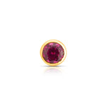 Front view of gold nose pin with round pink gemstone on white background