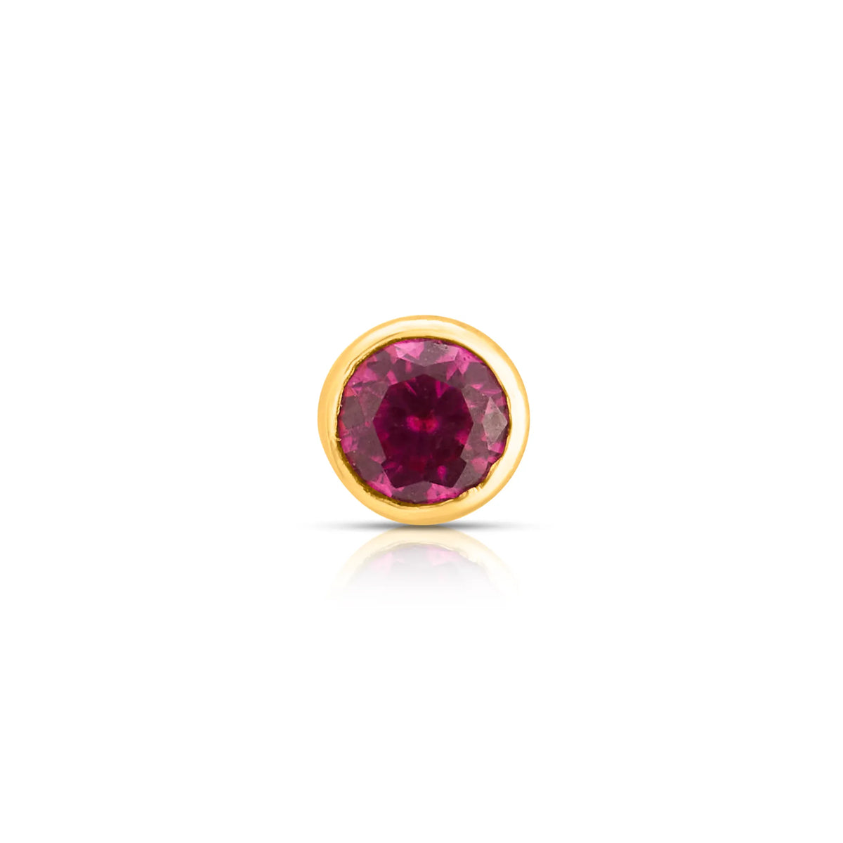 Front view of gold nose pin with round pink gemstone on white background
