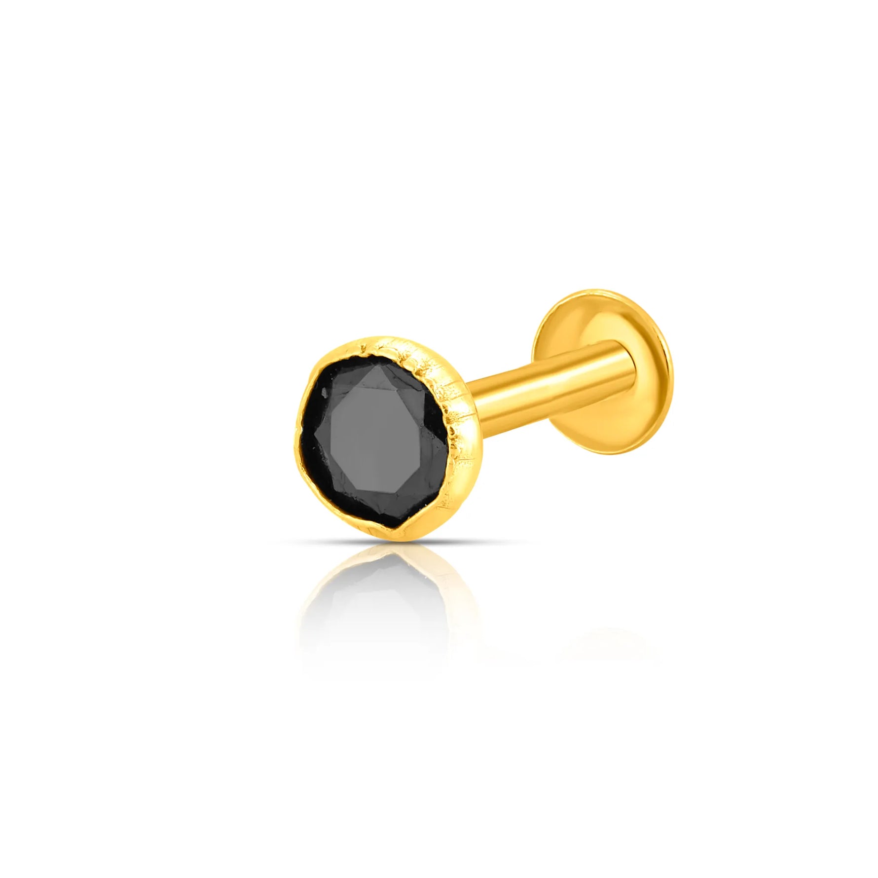 Side angle view of gold stud nose pin with black gemstone