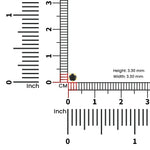 Scale view of black stone nose pin beside ruler