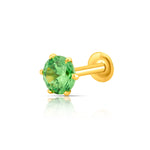 Side view of green stone gold nose pin highlighting vibrant color