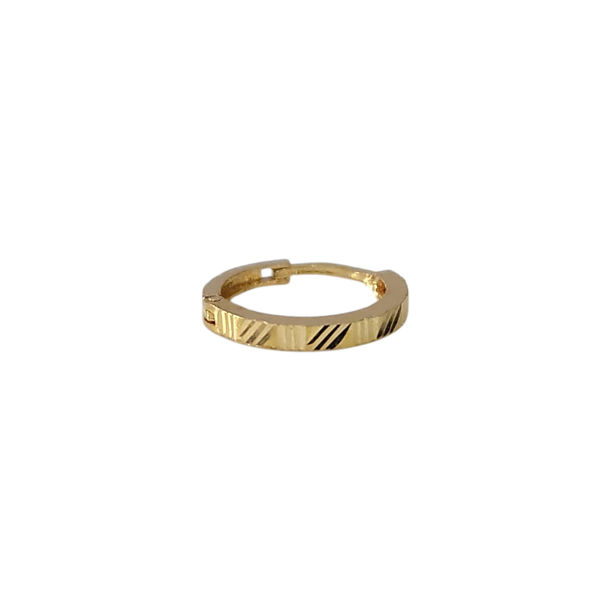 Top view of minimal 18K gold nose ring on a white background highlighting smooth circular finish