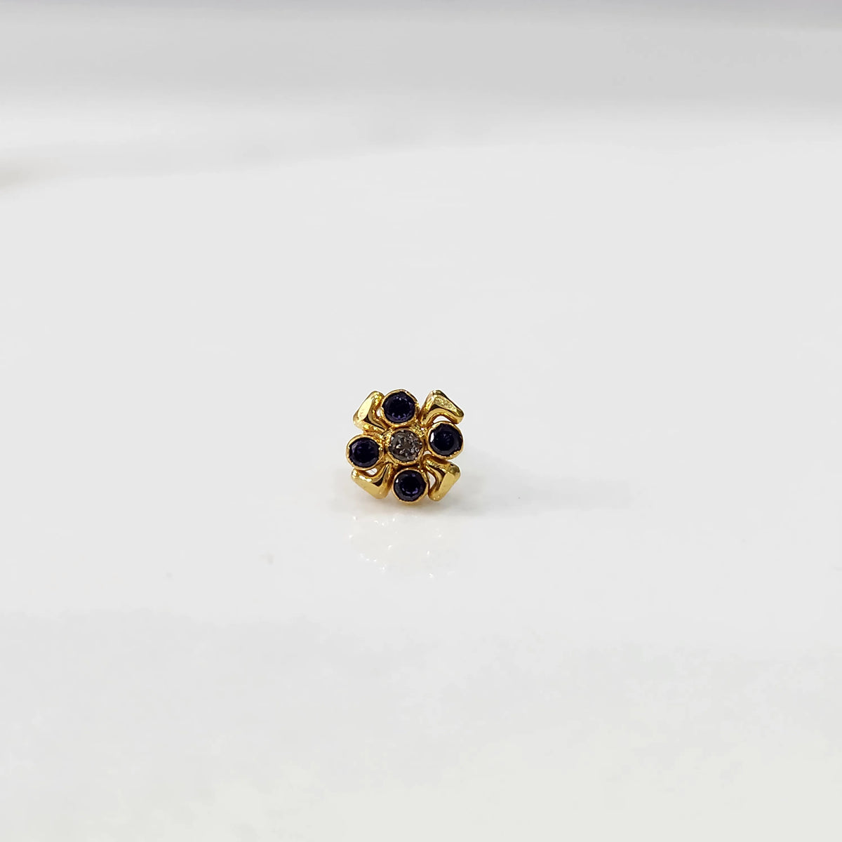 antique-gold-ring-blue-gemstone-flower-petal-design
