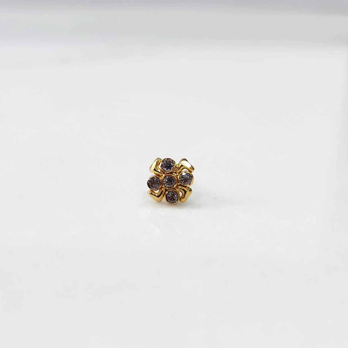 Gold ring with smoky quartz scalloped floral design, top view