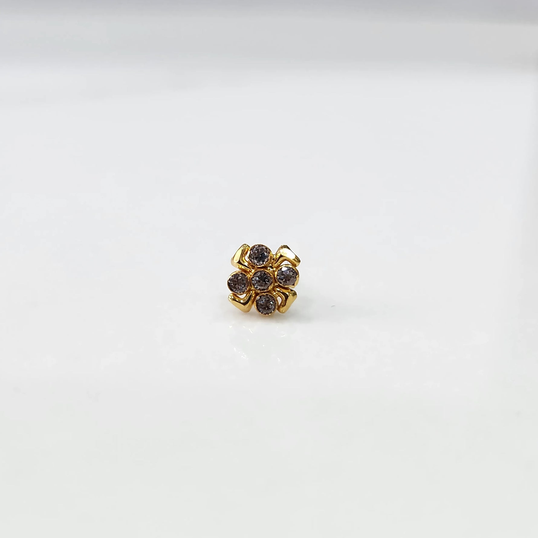 Gold ring with smoky quartz scalloped floral design, top view