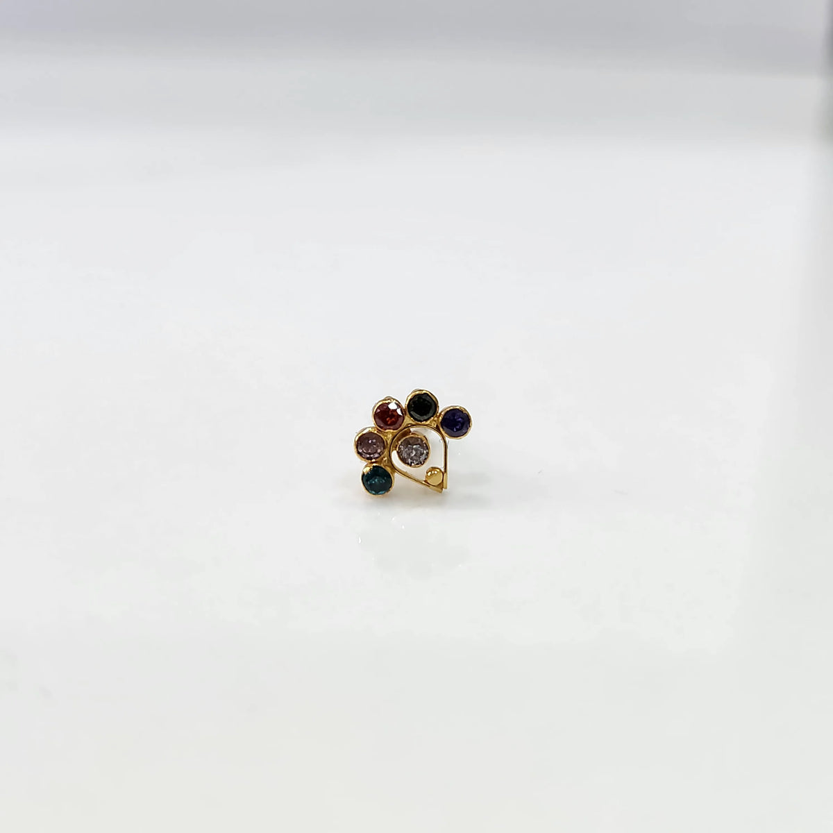 Gold ring with multicolor gemstone floral cluster design, front view
