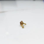 Gold ring with smoky quartz floral dangle design, side view