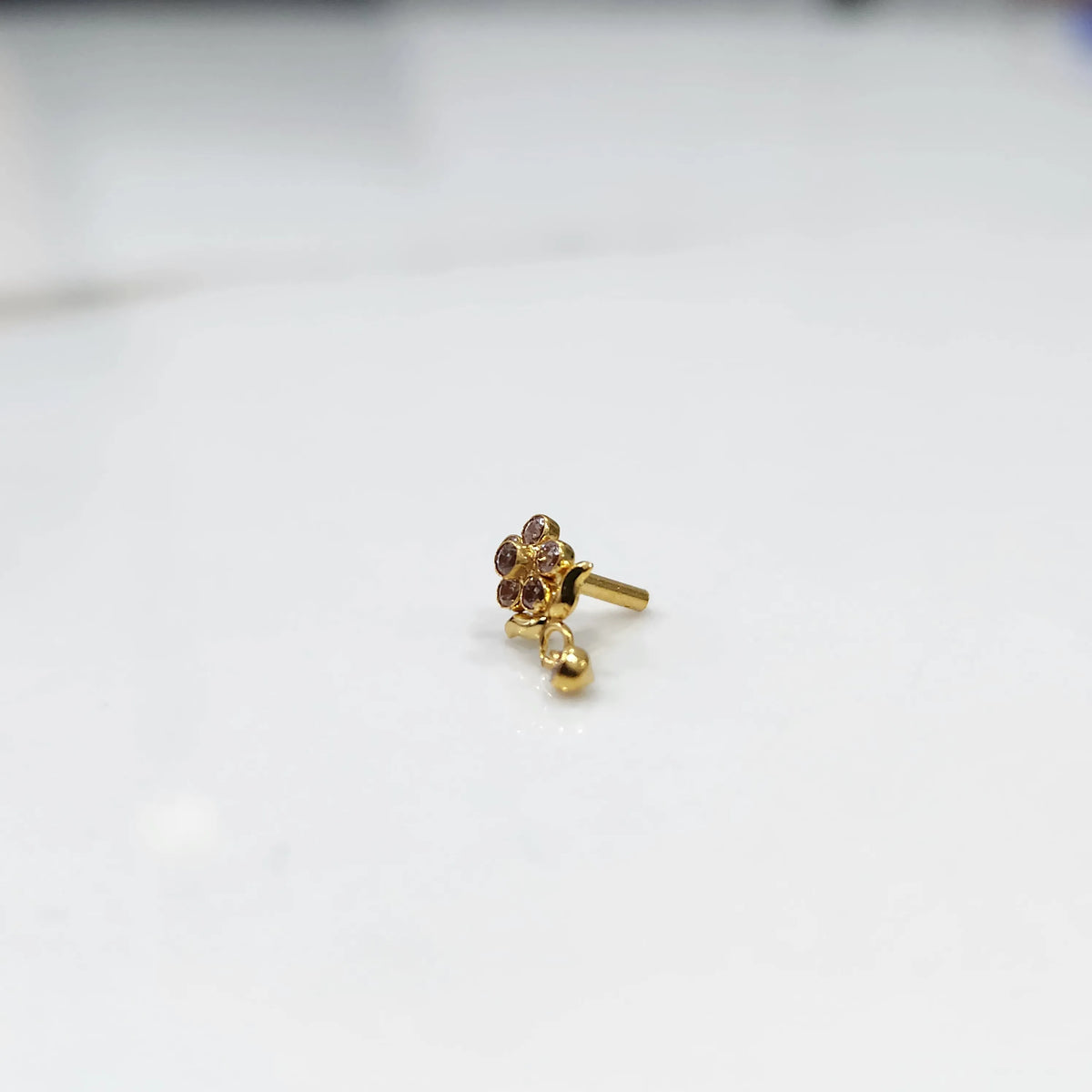 Gold ring with smoky quartz floral dangle design, side view