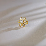 Six-petal flower diamond stud earring with bezel-set petals in gold