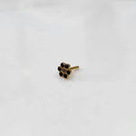 Nose pin design gold with compact floral arrangement on white background