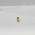 Gold flat back stud jewelry with polished sphere accent